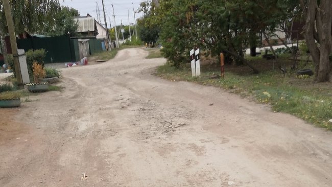 Жители проулка в Бузулуке все еще ждут обещанного пять лет назад улучшения дороги
